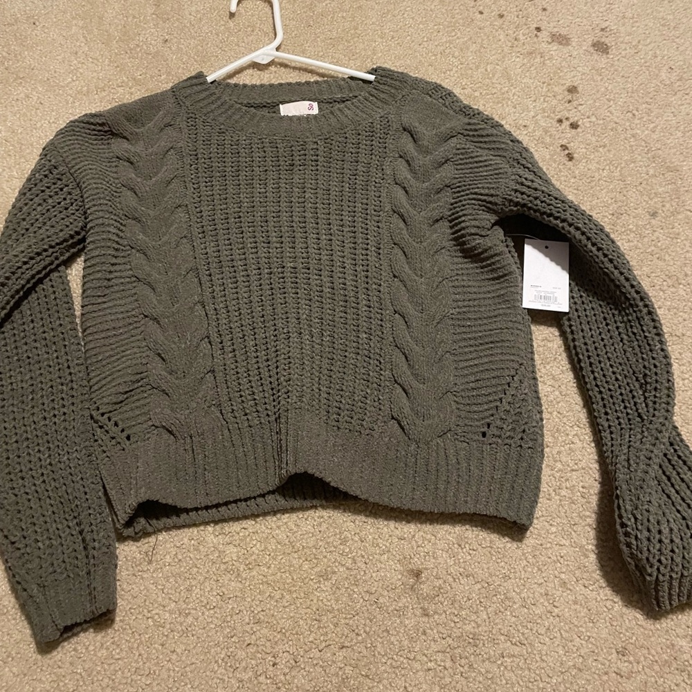 green sweater